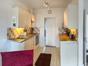 Open-plan design includes a well-equipped kitchen | Chaplin - Tathwell Lodge, Little Tathwell, near Louth