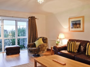 Living room with wood flooring | Bruichladdich, Rothesay, Isle of Bute