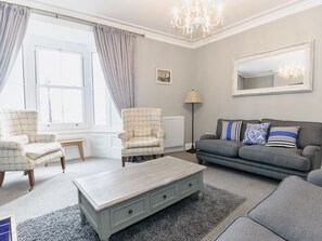 Second living room with large windows with view accross Whitby and the harbour | Frankland House, Whitby