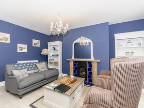 Living room with large windows with view accross Whitby and the harbour. | Frankland House, Whitby