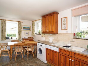 Farmhouse style kitchen with dining area | Ivy Cottage, Giggleswick near Settle