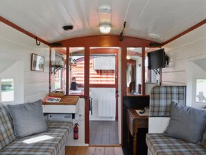 Living room | Brockford Railway Sidings - The Guards Van, Brockford, nr. Stowmarket