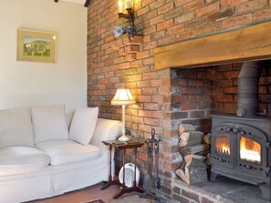 Charming living room with cosy wood burner | The Secret Cottage, Cromford, near Matlock