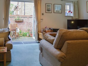 Living and dining area benefit from the natural light from the French doors | Trentham Cottage, Snettisham, near Hunstanton