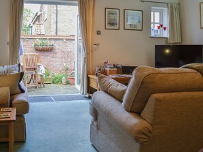 Living and dining area benefit from the natural light from the French doors | Trentham Cottage, Snettisham, near Hunstanton