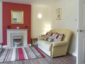 Comfy seating within lounge | 3 Greta Grove House - Greta Grove Apartments, Keswick