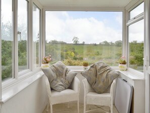 Great rural views from the porch seating area | Walter&rsquo;s Cottage, West Compton, near Shepton Mallet
