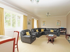 Spacious living/dining room with panoramic countryside views | Churchaven, Old Hunstanton