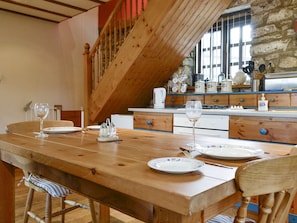 Convenient dining area | The Coach House at Old Vicarage Cottage, Betws-yn-Rhos, near Abergele