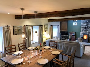 Elegant dining area and adjacent living room | Little Knott, Blawith, near Coniston