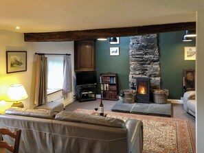 Warm and welcoming living room with wood burner | Little Knott, Blawith, near Coniston