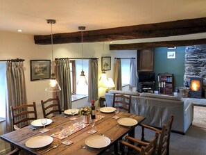 Elegant dining area and adjacent living room | Little Knott, Blawith, near Coniston