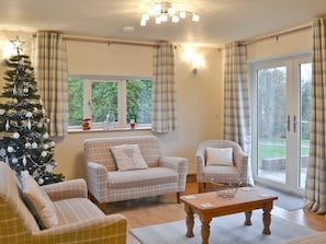 Open plan living room with patio doors | The Old Coach House, Ulrome near Bridlington