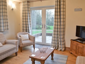 Open plan living room with patio doors | The Old Coach House, Ulrome near Bridlington