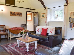 Comfortable living/dining room | Trenay Barn Cottage, St Neot, near Liskeard