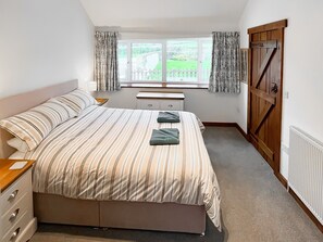 Double bedroom | Woodpecker - Manor Court Cottages, Shipton Gorge