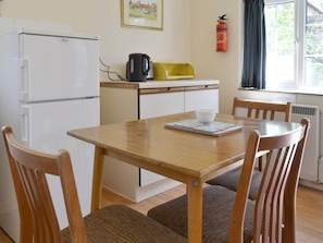 Convenient dining area within kitchen space | Lodge Cottage - Scarning Dale Cottages, Scarning, near Dereham