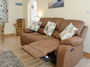 Comfy semi-reclining sofa | Hen Ysgubor - Bwlchgwyn Equestrian Holidays, Arthog, near Fairbourne