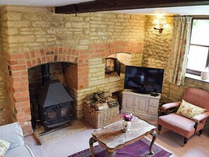 Cosy living room with wood burner | Picket Piece Cottage, Chadlington, near Chipping Norton