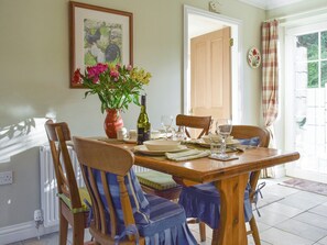 Convenient dining area within kitchen | The But ’n’ Ben - Hatton Cottages, Dunkeld, near Pitlochry