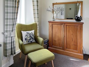 Relax in the &ldquo;reading corner&rdquo; where you will find a large selection of books and board games to keep the little or big ones happy | Kirnan Cottage, Kilmichael Glassary, near Lochgilphead