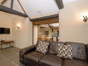 Living room with high beamed ceiling | The Old Forge, Kingston, near Corfe Castle