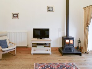 Welcoming living room with wood burner | The Hay Barn - Ash Farm Barns, North Willingham, near Market Rasen