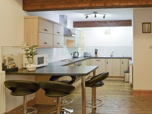 Well-equipped kitchen with dining bar | The Hay Barn - Ash Farm Barns, North Willingham, near Market Rasen