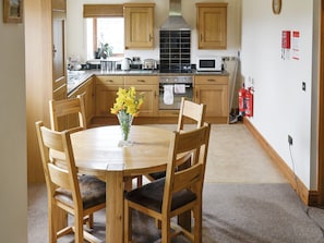 Well-equipped kitchen and convenient dining area | Hutter Hill Barn East, Silsden near Skipton