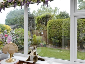 View over the garden from the conservatory | Cosy Corner, Bridlington