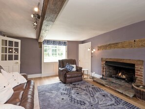 Cosy living room with TV and real fire | Cravens Manor, Henham, near Southwold