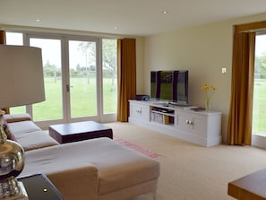 Light and airy comfortable living area | The Glass Room, Ardleigh Heath, near Colchester