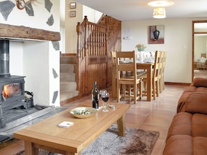 Spacious lounge with wood burning fire and dining area | Ty Hir - Bwlchgwyn Equestrian Holidays, Arthog, near Fairbourne