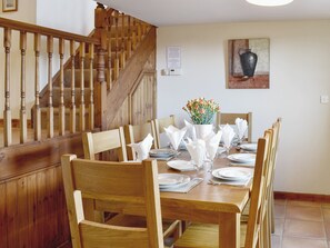 Heritage dining table and stairs to upper level | Ty Hir - Bwlchgwyn Equestrian Holidays, Arthog, near Fairbourne
