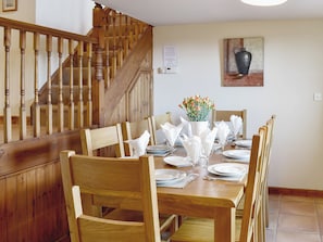 Heritage dining table and stairs to upper level | Ty Hir - Bwlchgwyn Equestrian Holidays, Arthog, near Fairbourne