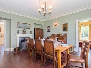 Large dining room with open fire | Tilney Hall, Kings Lynn