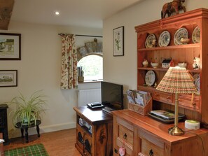 Living room with TV | Bryn Dedwydd Cottage, Eryrys, near Mold