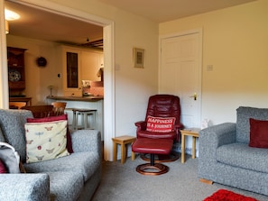 Tastefully furnished living room with patio doors  | Fell View, Kettlewell, near Buckden