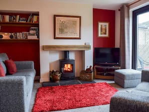 Tastefully furnished living room with patio doors  | Fell View, Kettlewell, near Buckden