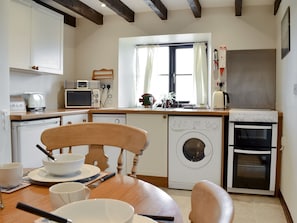 Charming kitchen/ dining room | Black Bull Cottage, Ugthorpe, near Whitby