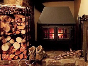 Cosy woodburning stove | Heale Cottage, Littleham, near Bideford