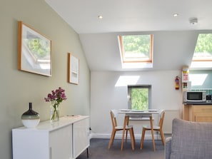 Modest dining area and adjacent kitchen | Biggan Mews - Oxtoby’s Cottages York, York