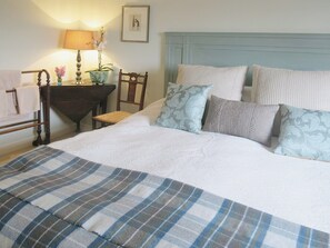 The double bedroom has luxurious bed linen and cosy, romantic furnishings | The Coach House - Berrington House, Tenbury Wells