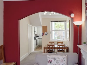 Living room leading directly into dining room | Millie’s Cottage, Keswick
