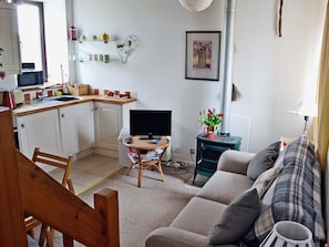 Open plan living space with gas wood burner | Honeysuckle Cottage, Nercwys near Mold