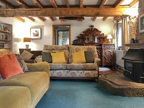 Spacious lounge with exposed wooden frame | The Mill House, Lea, near Ross-on-Wye