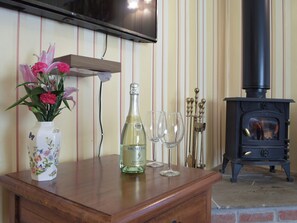 Living room with wood burner | Carthouse Cottage, Cosheston near Pembroke