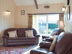 Living room with wood burner | Carthouse Cottage, Cosheston near Pembroke