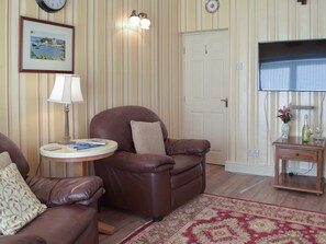 Living room with wood burner | Carthouse Cottage, Cosheston near Pembroke