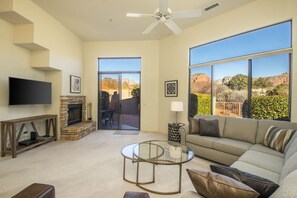 Living room w/ Red Rock views. Please note: No fires permitted in the fireplace.